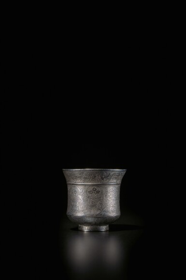 View full screen - View 1 of Lot 263. A superb 'bird and flower' silver cup, Tang dynasty | 唐 銀鏨花鳥紋盃.
