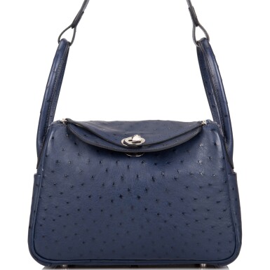 View full screen - View 1 of Lot 4. Hèrmes Bleu Iris Lindy 26cm of Ostrich with Palladium Hardware.