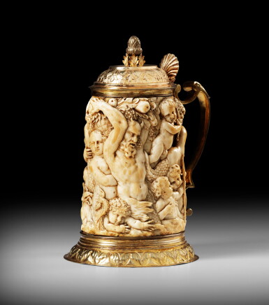 View full screen - View 1 of Lot 69. Important ivory tankard with a Bacchic scene | Importante chope en ivoire à décor de Bacchanale marine.