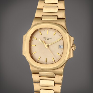 View full screen - View 1 of Lot 255. Reference 3800 Nautilus | A yellow gold automatic wristwatch with date and bracelet, Circa 1980.