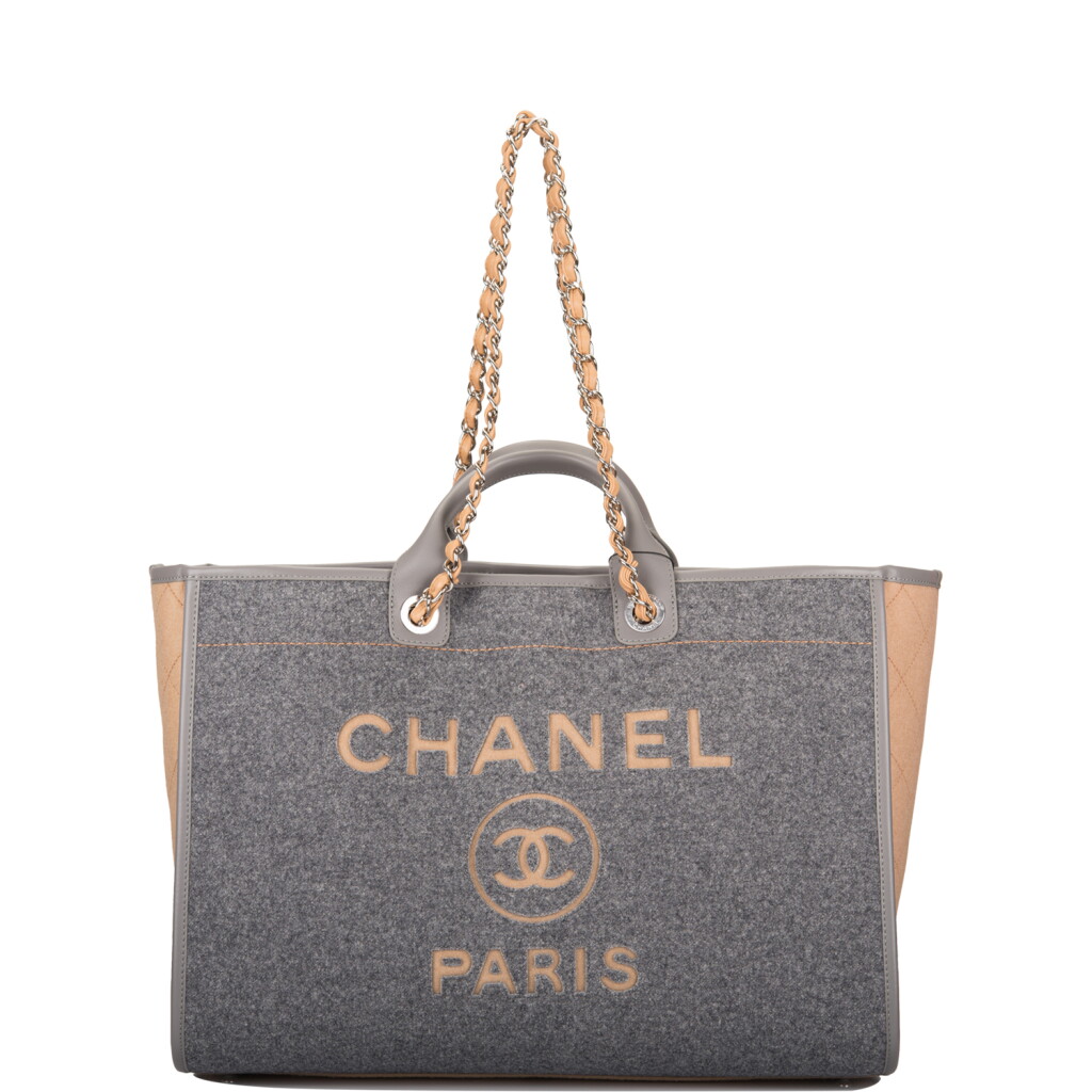View full screen - View 1 of Lot 110. Chanel Grey and Beige Large Deauville of Wool Felt with Silver Tone Hardware.