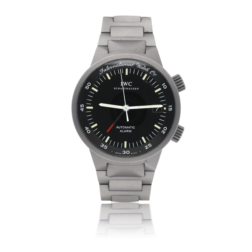 View full screen - View 1 of Lot 82. IWC | ALARM, A TITANIUM AUTOMATIC ALARM WRISTWATCH WITH DATE AND BRACELET CIRCA 2000.