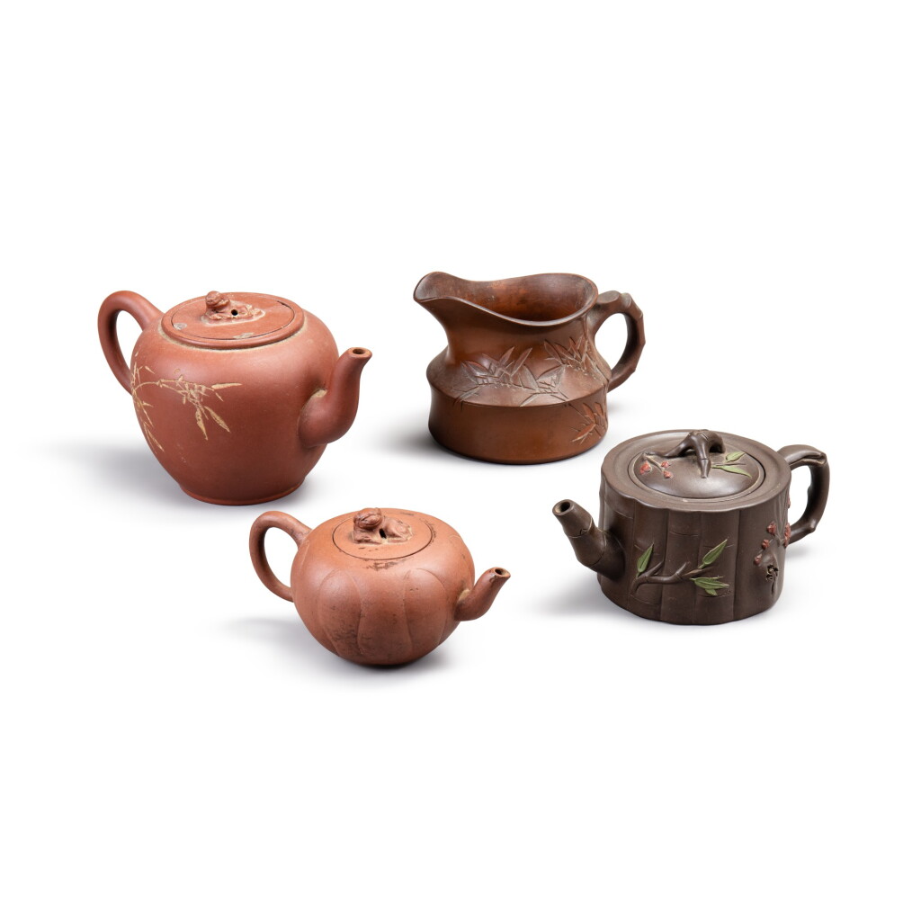 View full screen - View 1 of Lot 246. Three 'Yixing' teapots and covers and a ewer Republican period | 民國 宜興紫砂壺一組四件.