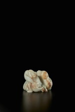 A celadon jade 'groom and camel' group, Ming / Qing dynasty
