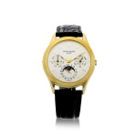 REFERENCE 3940 A YELLOW GOLD PERPETUAL CALENDAR WRISTWATCH WITH MOON PHASES, 24 HOURS, AND LEAP YEAR INDICATION, CIRCA 1986