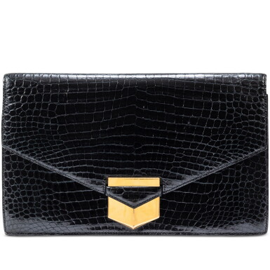 View full screen - View 1 of Lot 623. Vintage Black Shiny Porosus Crocodile Pan Clutch Gold Hardware, 1980.