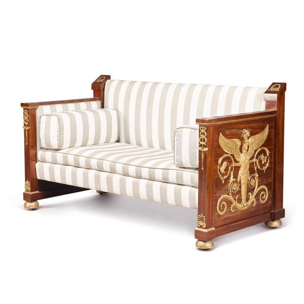 View full screen - View 1 of Lot 117. An Empire style gilt-bronze mounted carved giltwood and mahogany settee, late 19th/early 20th century.