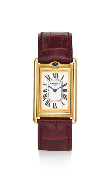 View full screen - View 1 of Lot 8225. CARTIER | TANK BASCULANTE, A LIMITED EDITION YELLOW GOLD REVERSIBLE WRISTWATCH, CIRCA 2000.