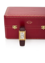 IN CELEBRATION OF CARTIER'S 150TH ANNIVERSARY, TANK A BASCULANTE LIMITED EDITION YELLOW GOLD REVERSIBLE WRISTWATCH (IN OCCASIONE DELL’ANNIVERSARIO DEI 150 ANNI DI CARTIER, TANK A BASCULANTE OROLOGIO DA POLSO REVERSIBILE BASCULANTE IN ORO GIALLO IN EDIZIONE LIMITATA) CIRCA 1997 | CARTIER, PARIS