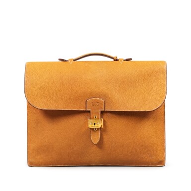 View full screen - View 1 of Lot 31. HERMES Gold leather briefcase gold hardware, 1983 | Attaché case cuir gold garniture dorée, 1983.