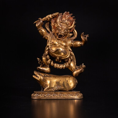 View full screen - View 1 of Lot 345. A gilt-bronze figure of Yama Dharmaraja, Qing dynasty, 17th / 18th century.
