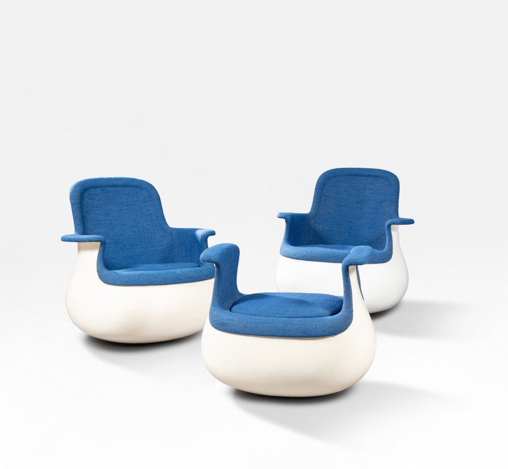 View full screen - View 1 of Lot 13. Pair of Culbuto armchairs and ottoman | Paire de fauteuils et ottoman Culbuto.