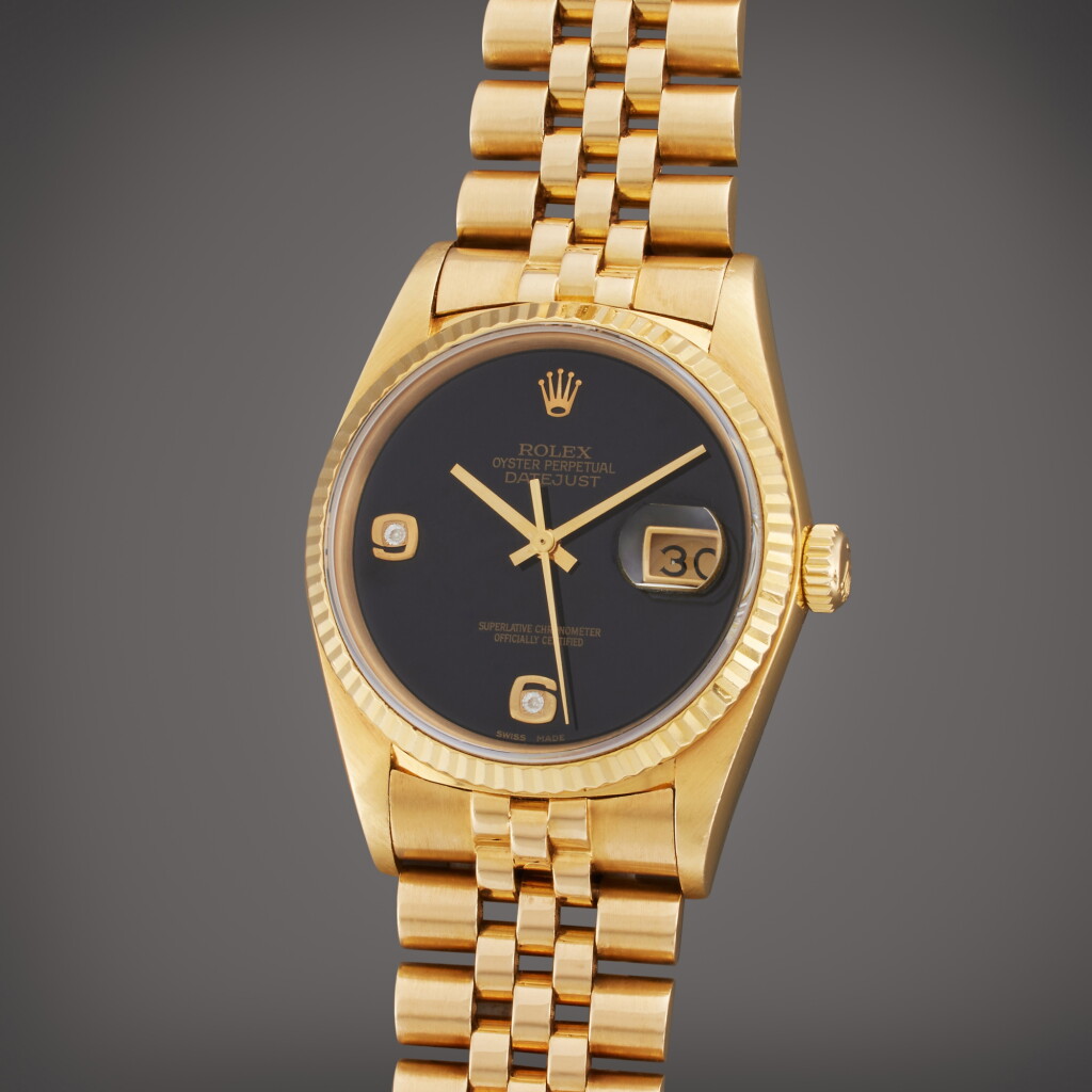 View full screen - View 1 of Lot 329. Reference 16018 Datejust | A yellow gold and diamond-set automatic wristwatch with date, bracelet, and onyx dial, Circa 1987.