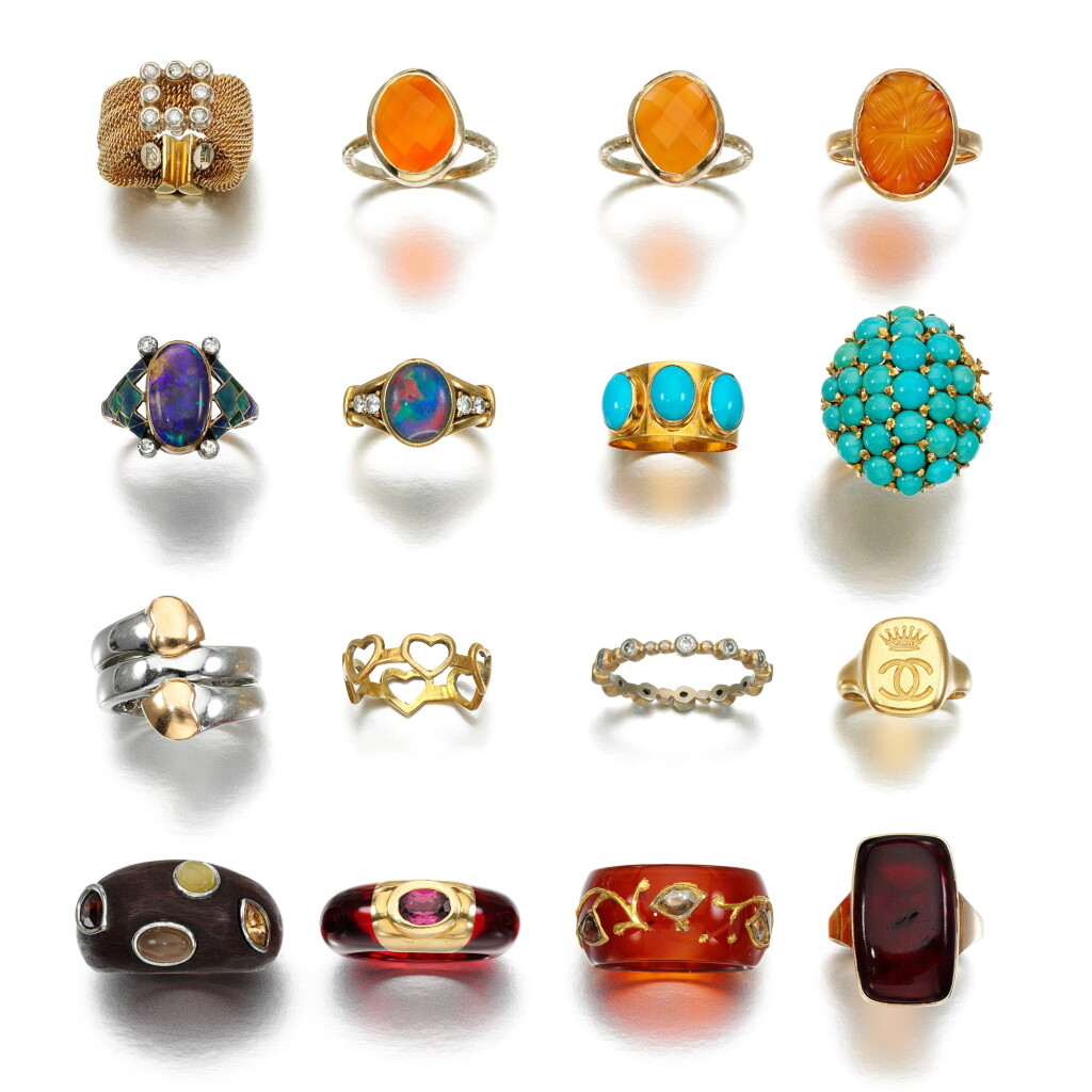 View full screen - View 1 of Lot 102. Sixteen gem set rings.