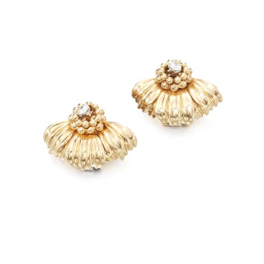View full screen - View 1 of Lot 102. Pair of gold and diamond ear clips.