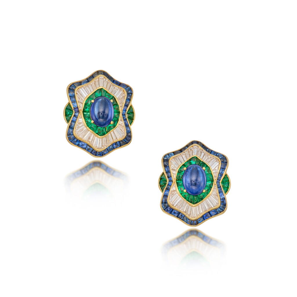 View full screen - View 1 of Lot 133. A Pair of Sapphire, Emerald and Diamond Earclips.