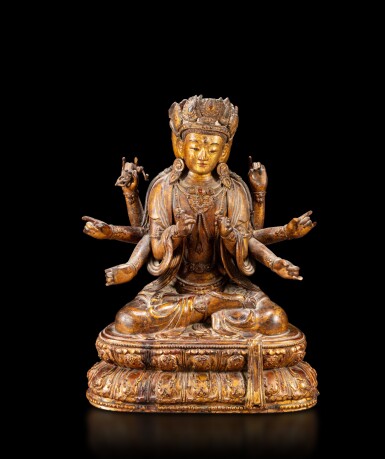 View full screen - View 1 of Lot 102. A lacquered-wood figure of Manjushri, Qing dynasty, 17th-18th century | 清十七至十八世紀 漆金木雕文殊菩薩坐像.