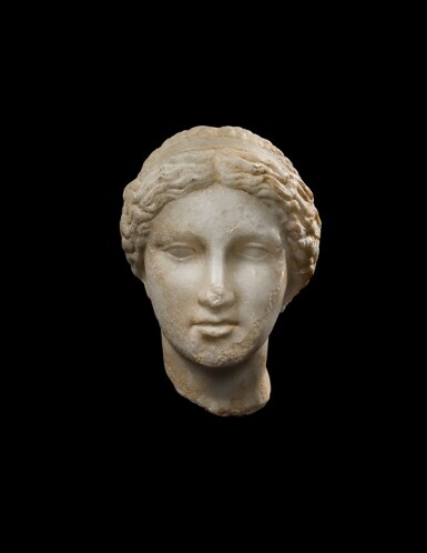 View full screen - View 1 of Lot 102. A Hellenistic Marble Head of Aphrodite, circa 3rd/2nd Century B.C..