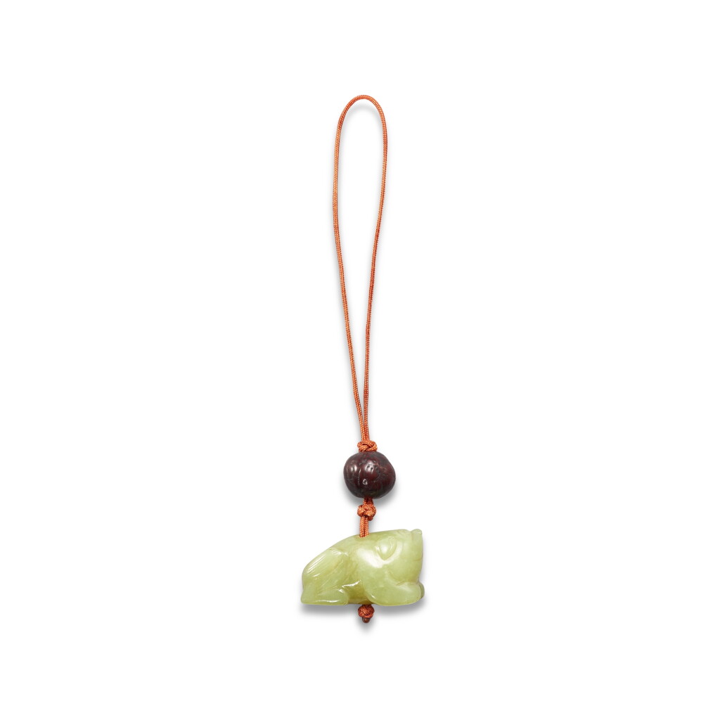 View full screen - View 1 of Lot 481. A celadon and russet jade figure of a mythical beast, Ming dynasty 明 青褐玉瑞獸.