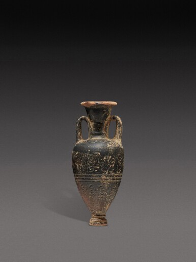 View full screen - View 1 of Lot 104. An Attic Black-glazed Pointed Amphoriskos, circa late 5th Century B.C..