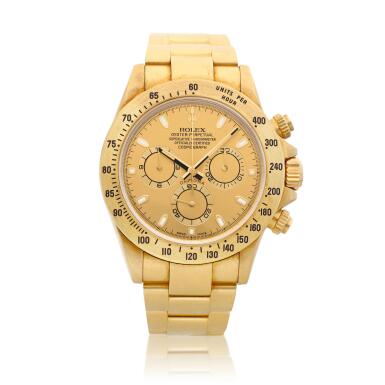 View full screen - View 1 of Lot 2065. Cosmograph Daytona, Reference 116528 | A brushed yellow gold chronograph wristwatch with bracelet, Circa 2014, Formerly in the collection of Eric Clapton, CBE | 勞力士 | Cosmograph Daytona 型號116528 | 黃金計時鏈帶腕錶,約2014年製,原為 Eric Clapton, CBE 收藏.