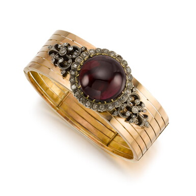 View full screen - View 1 of Lot 169. Garnet and diamond bangle, 1880s.