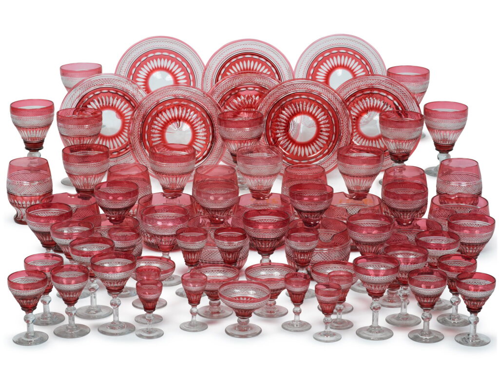View full screen - View 1 of Lot 79. A Bohemian Cranberry-Overlay Cut-Glass Table Service, 20th Century.