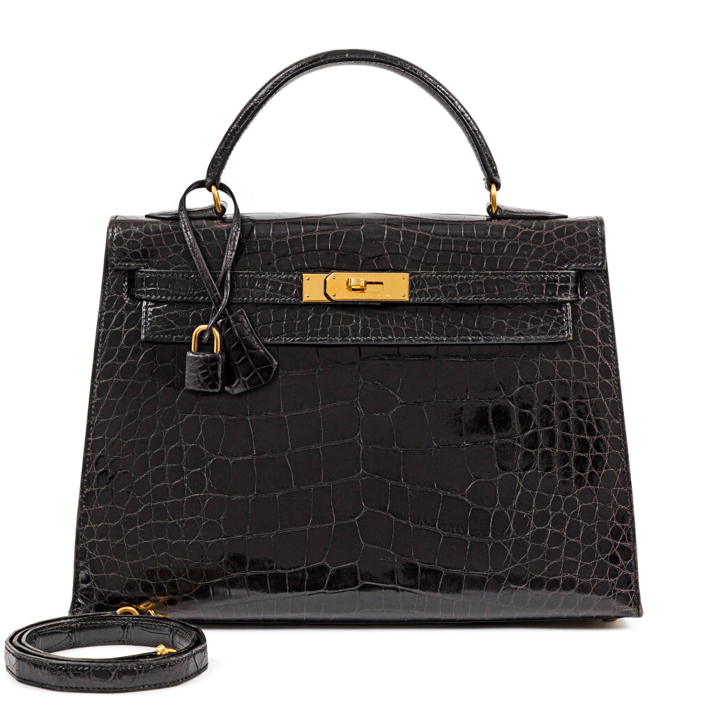 View full screen - View 1 of Lot 724. Vintage Black Shiny Mississippiensis Alligator Kelly 32 Sellier Gold Hardware, 1996.