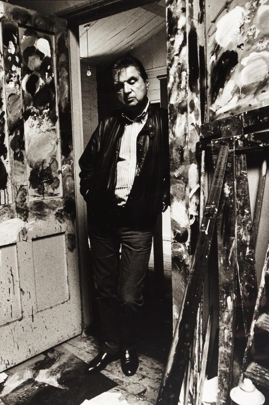 View full screen - View 1 of Lot 44. BRUCE BERNARD | FRANCIS BACON IN THE DOORWAY OF HIS STUDIO, 1984.