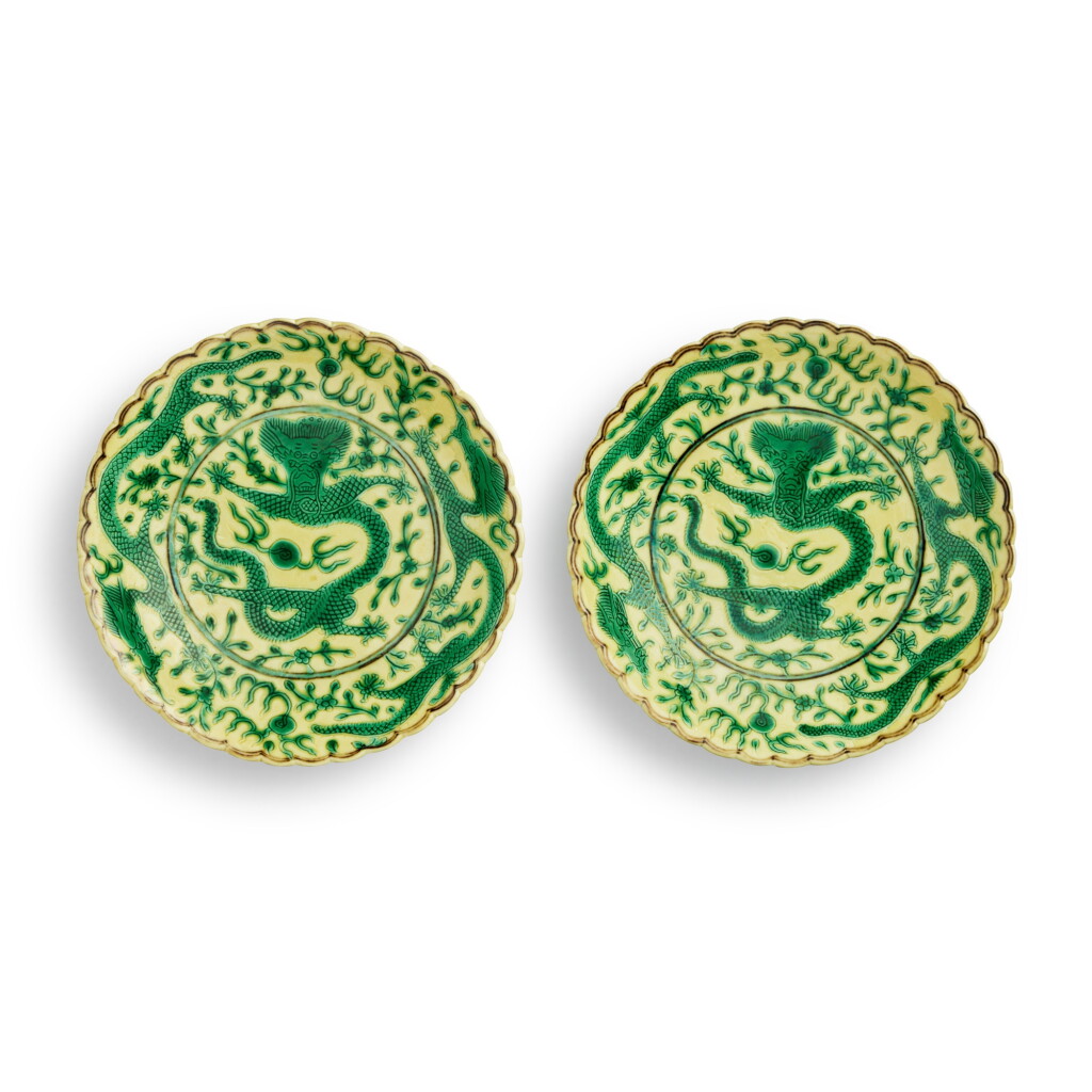 View full screen - View 1 of Lot 1041. A pair of yellow-ground green-enameled 'dragon' dishes, Qing dynasty, Guangxu period | 清光緒 黃地綠彩趕珠龍紋花口小盤一對 《清華珍品》款.