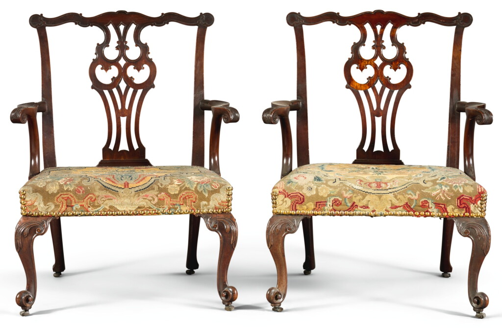 View full screen - View 1 of Lot 48. A PAIR OF GEORGE II CARVED MAHOGANY OPEN ARMCHAIRS, CIRCA 1755.