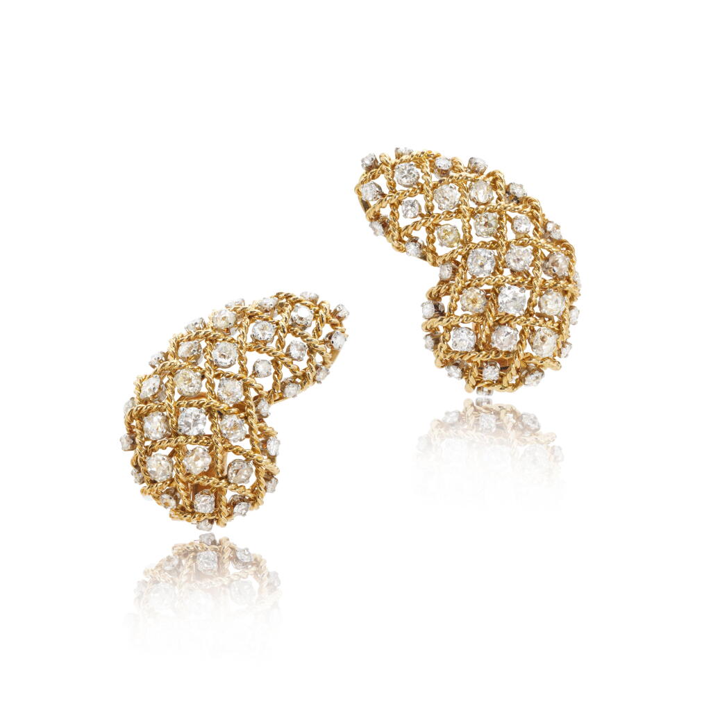 View full screen - View 1 of Lot 1099. Pair of diamond ear clips, 1950s.