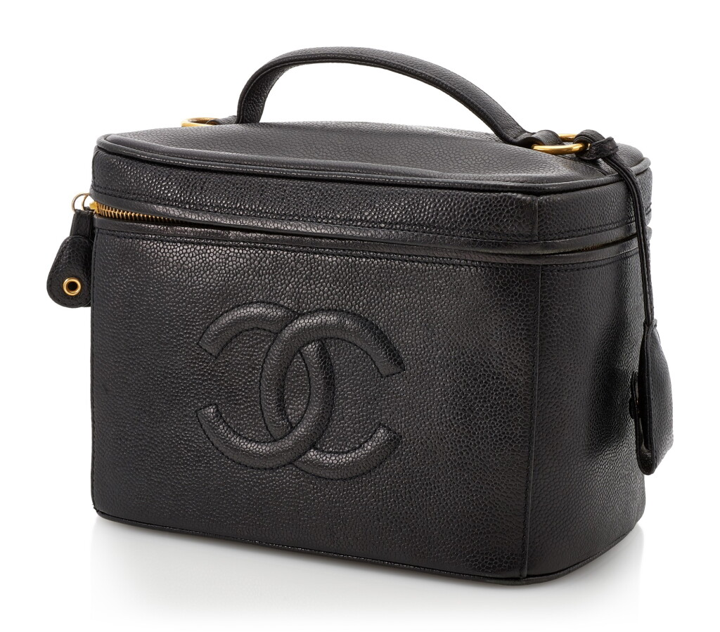 View full screen - View 1 of Lot 92. BLACK LEATHER COSMETIC VANITY HAND BAG WITH GOLD-TONE METAL, CHANEL.