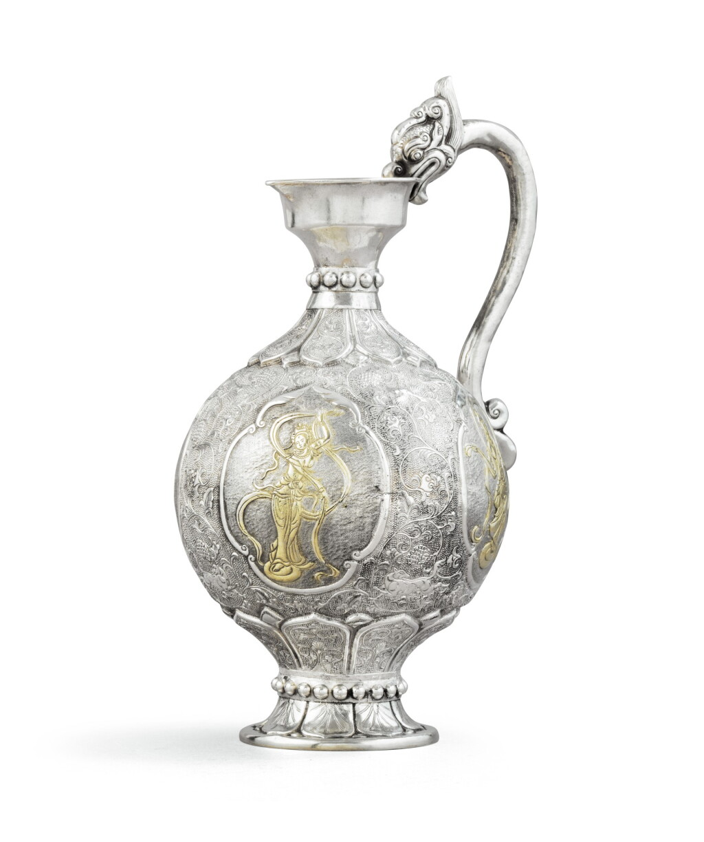 View full screen - View 1 of Lot 51. A Chinese parcel-gilt silver water-jug, 19th century | Pot à eau en argent et vermeil, Chine, XIXe siècle.