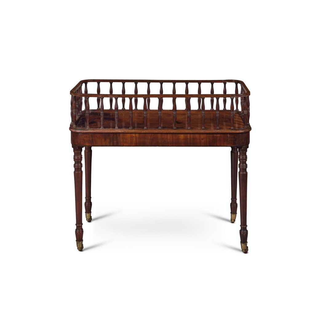 View full screen - View 1 of Lot 1194. A Regency Mahogany Spindle-Sided Bottle Stand, Circa 1805.