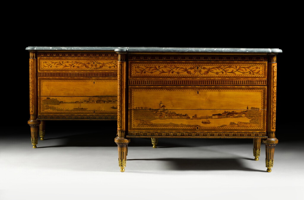 View full screen - View 1 of Lot 21. A pair of Russian neoclassical fruitwood marquetry commodes, late 18th century, attributed to Nikifor Vasilyev.