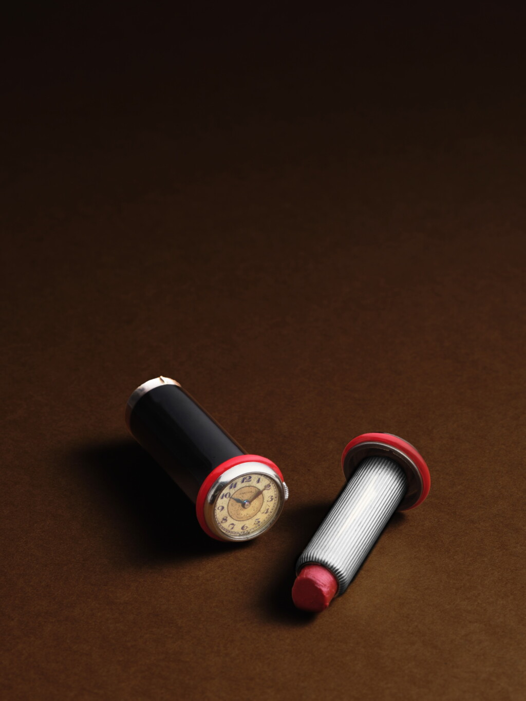 View full screen - View 1 of Lot 2151. Lipstick Watch | An elegant Art Deco, silver, black and red lacquer lipstick holder mounted with a watch, Circa 1925.