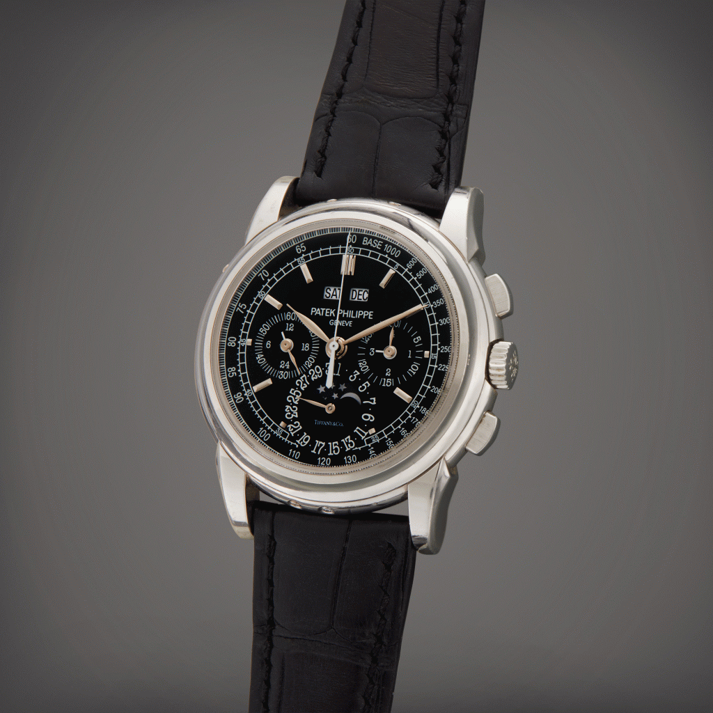 View full screen - View 1 of Lot 105. Reference 5970 | Retailed by Tiffany & Co.: A platinum perpetual calendar chronograph wristwatch with moon phases, 24 hours and leap year indication, Circa 2010 | 零售商為蒂芙尼:百達翡麗 型號 5970 鉑金萬年曆計時腕錶備月相、24小時及閏年顯示,製作年份約 2010.