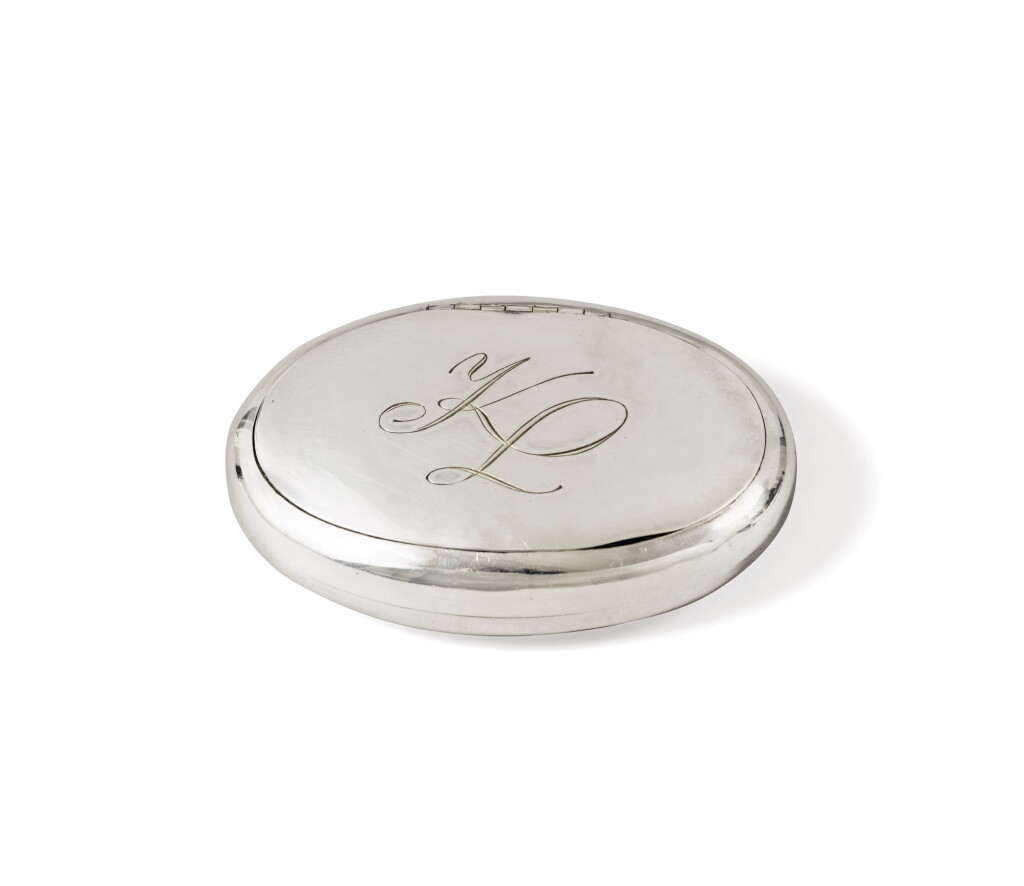 View full screen - View 1 of Lot 399. A silver-plated oval box monogrammed KL | Boîte ovale en métal argenté monogrammée KL.