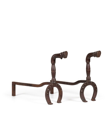 View full screen - View 1 of Lot 112. A pair of cast iron chenets, circa 1930 - 1940 | Paire de chenets en fonte de fer, vers 1930 - 1940.