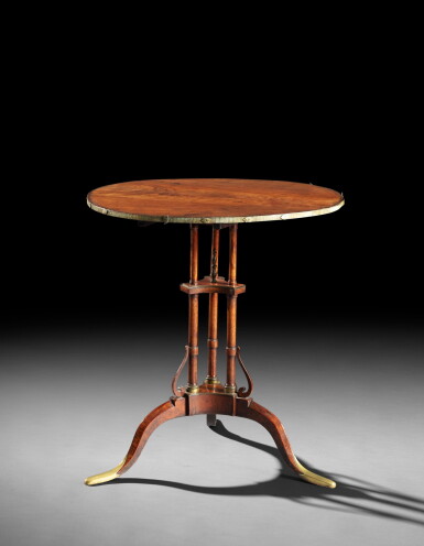 View full screen - View 1 of Lot 41. A mahogany gilt-bronze gueridon, late 18th century, in the taste of David Roentgen | Guéridon en acajou et laiton doré de la fin du XVIIIème siècle, dans le goût de David Roentgen.