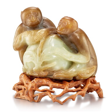 View full screen - View 1 of Lot 488. A celadon and russet jade 'monkey and peach' group, Qing dynasty, 18th - 19th century 清十八至十九世紀 玉雕靈猴獻壽.