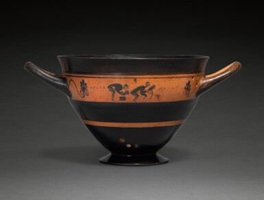 View full screen - View 1 of Lot 109. An Attic Black-figured Skyphos, circa 540-520 B.C..