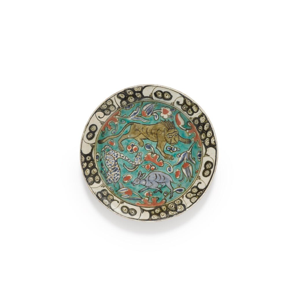 View full screen - View 1 of Lot 227. An Iznik polychrome pottery dish with animals, Turkey, circa 1600.