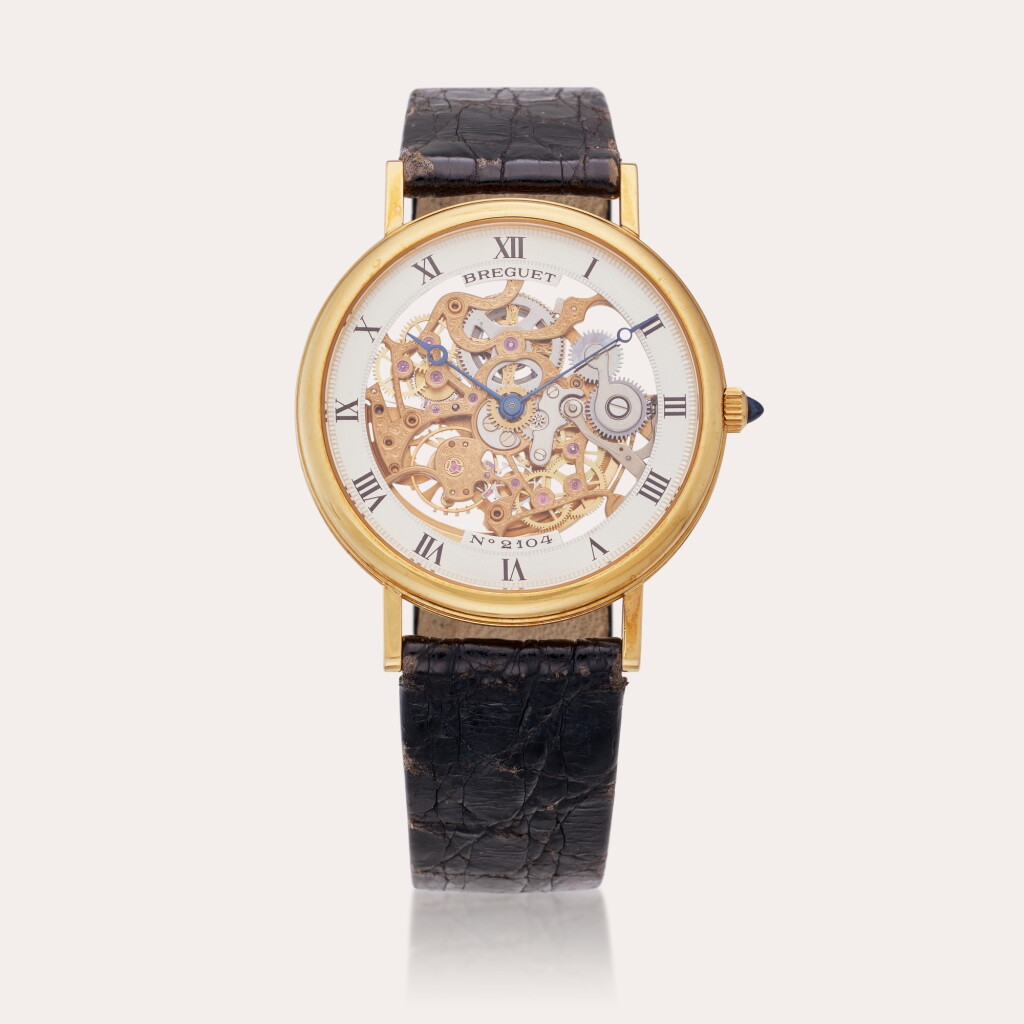 View full screen - View 1 of Lot 476. Reference 3030 | A yellow gold skeletonized automatic wristwatch, Circa 1995.