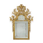 An Italian carved giltwood mirror, Parma, circa 1745, attributed to Antonio Vernieri (active 1739-1764)