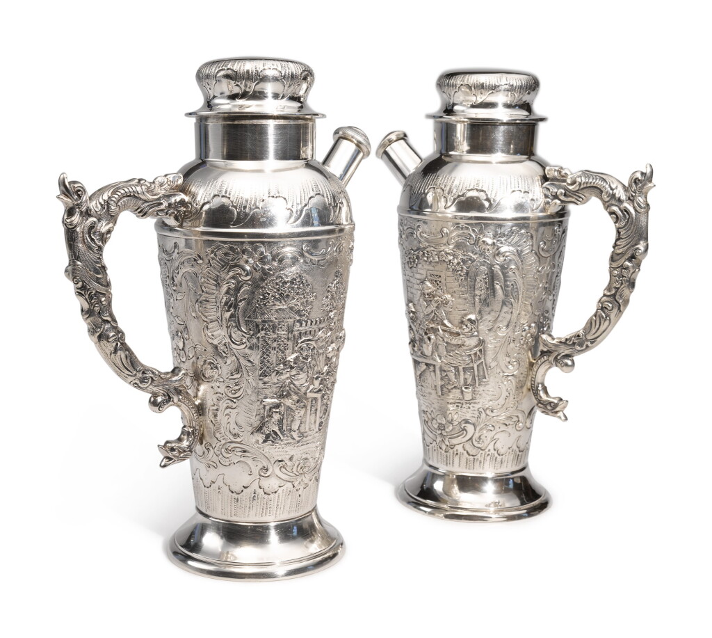 View full screen - View 1 of Lot 322. A PAIR OF GERMAN SILVER COCKTAIL SHAKERS, MAKER'S MARK WH/H IN CIRCLE, CIRCA 1900.