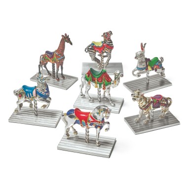View full screen - View 1 of Lot 1851. A GROUP OF SEVEN SILVER AND ENAMEL CAROUSEL FIGURES, DESIGNED BY GENE MOORE FOR TIFFANY & CO., NEW YORK, CIRCA 1990.