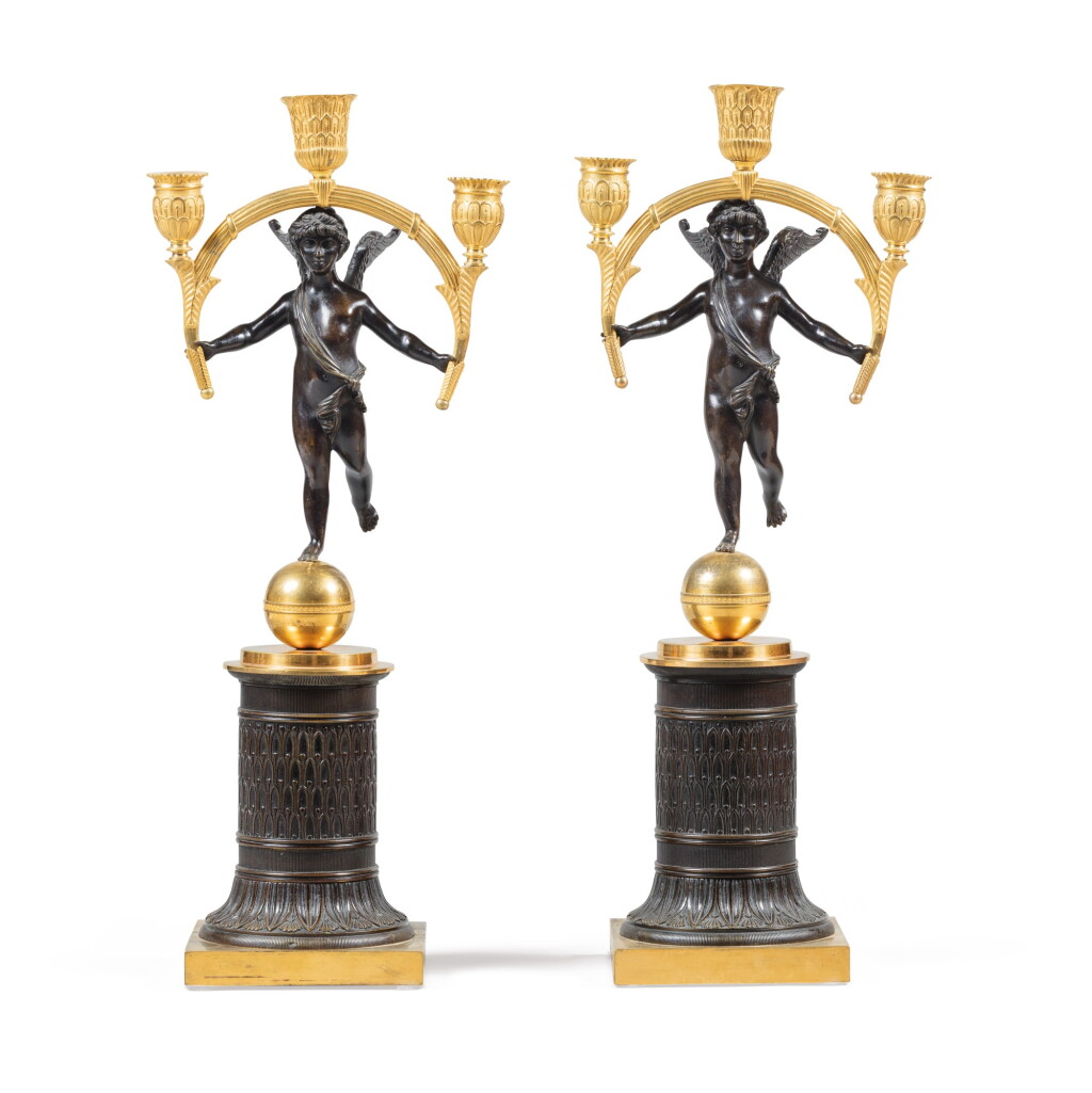 View full screen - View 1 of Lot 10. A pair of patinated and gilt-bronze candelabra, French Restauration, circa 1830 .