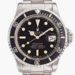 Reference 1680 'Red' Submariner | A stainless steel automatic wristwatch with date and bracelet, Circa 1973